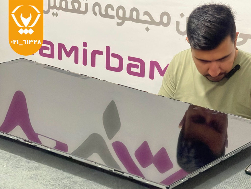 خطوط سیاهوسفید عمودی سرتاسر تصویر تلویزیون الجی به دلیل نقص برد T‑Con یا خرابی پنل